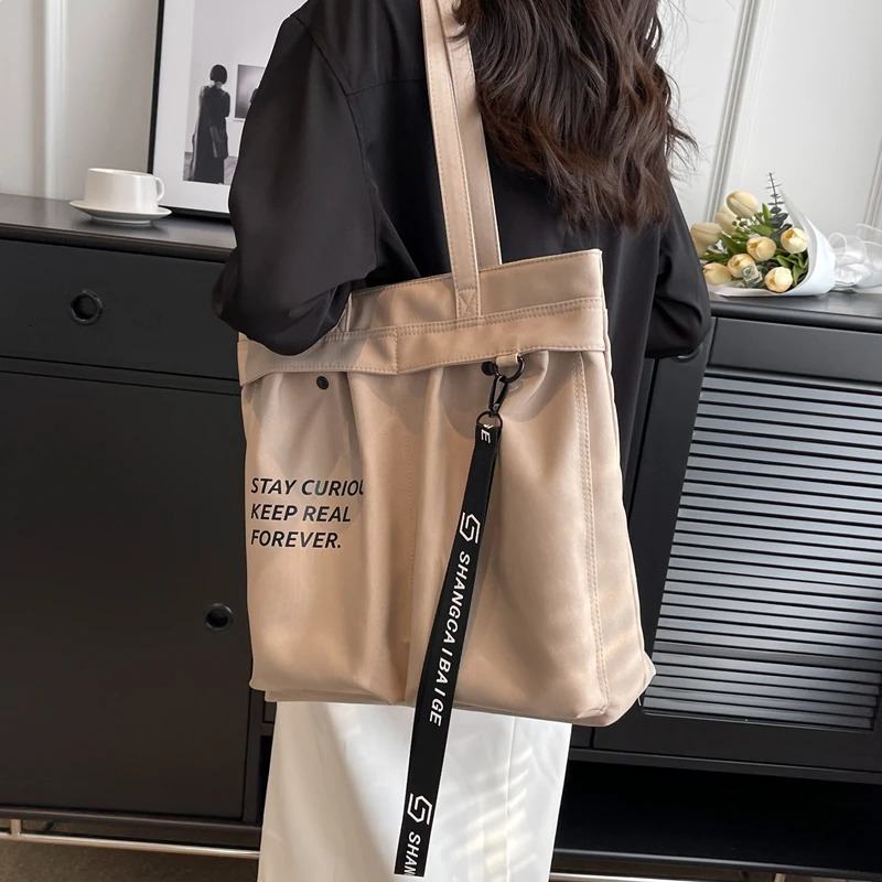 Korean casual canvas handbag womens large capacity letter bottom arm shoulder bag Ins fashion student handbag 241008