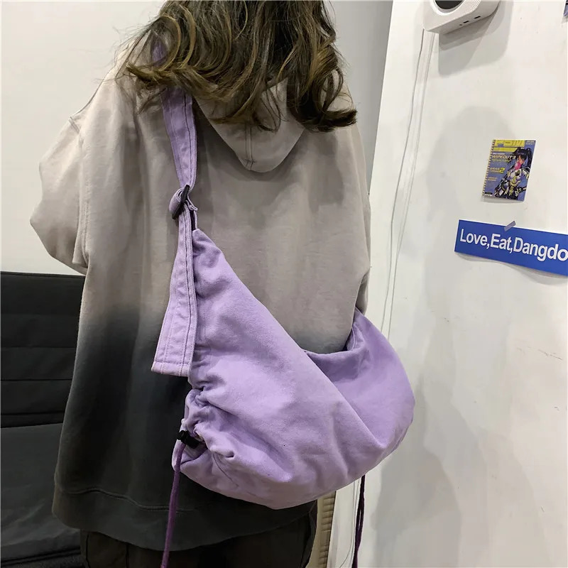 Original Korean Ins messenger canvas bag womens fashion large capacity Japanese student shoulder Ins diagonal garbage bag 241008