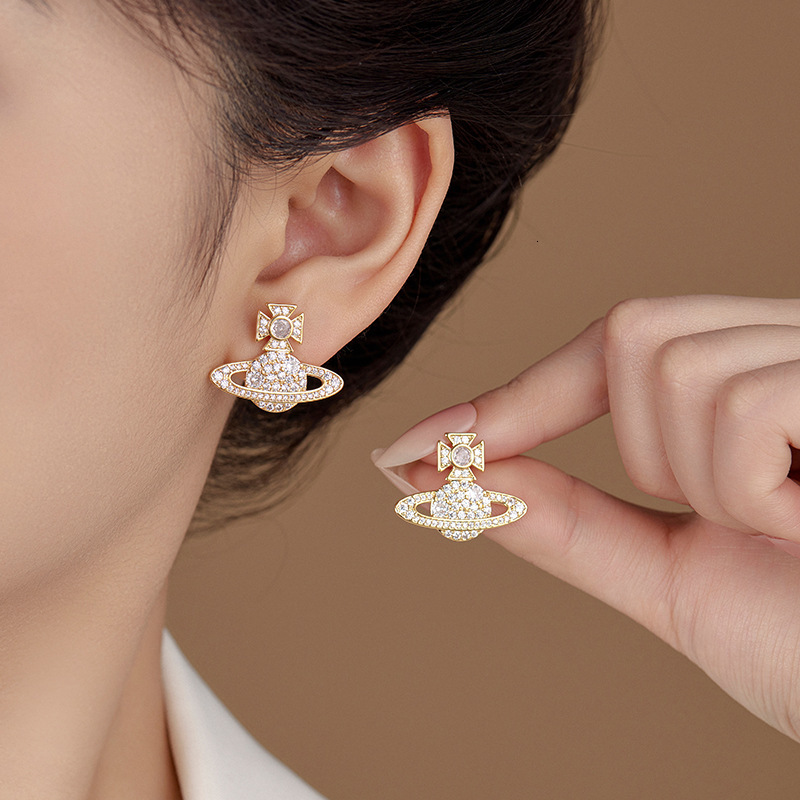 Light , fashionable, high-end, zirconia female niche design, Saturn earrings, versatile temperament, and atmospheric earring trend