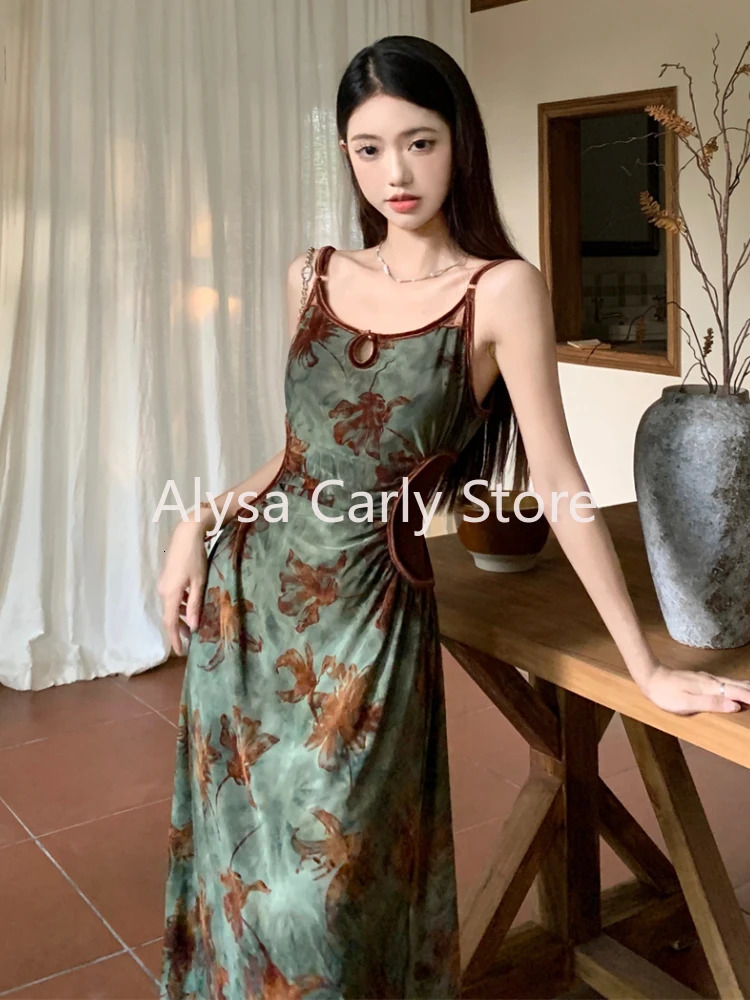 Retro elegant floral slip dress for women designed with a hollow open collar and featuring Korean velvet long skirt. Womens autumn matching two-piece 