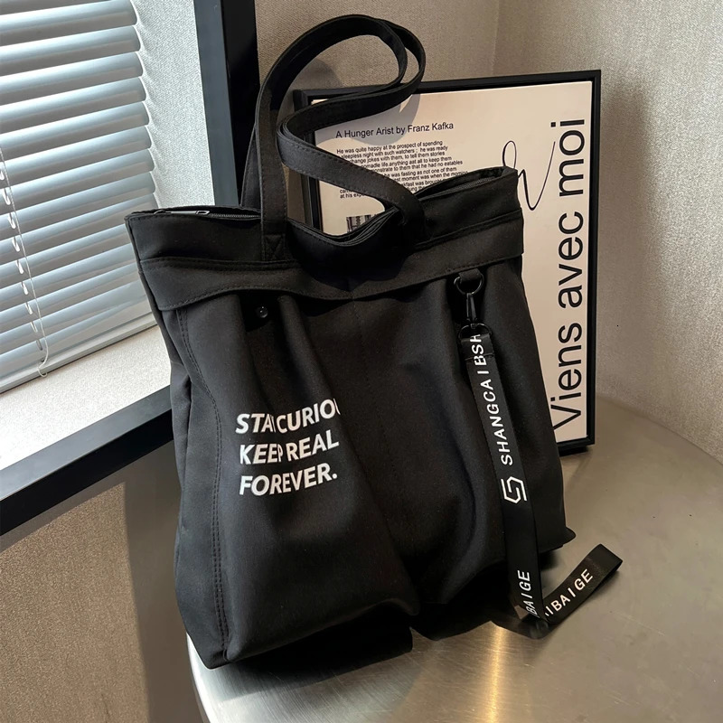 Korean casual canvas handbag womens large capacity letter bottom arm shoulder bag Ins fashion student handbag 241008