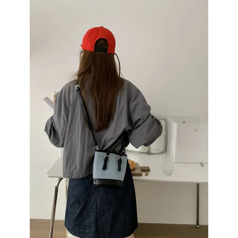 Small custom denim splicing bucket bag autumn and winter Korean version handheld shoulder bag horizontal womens bag 241008