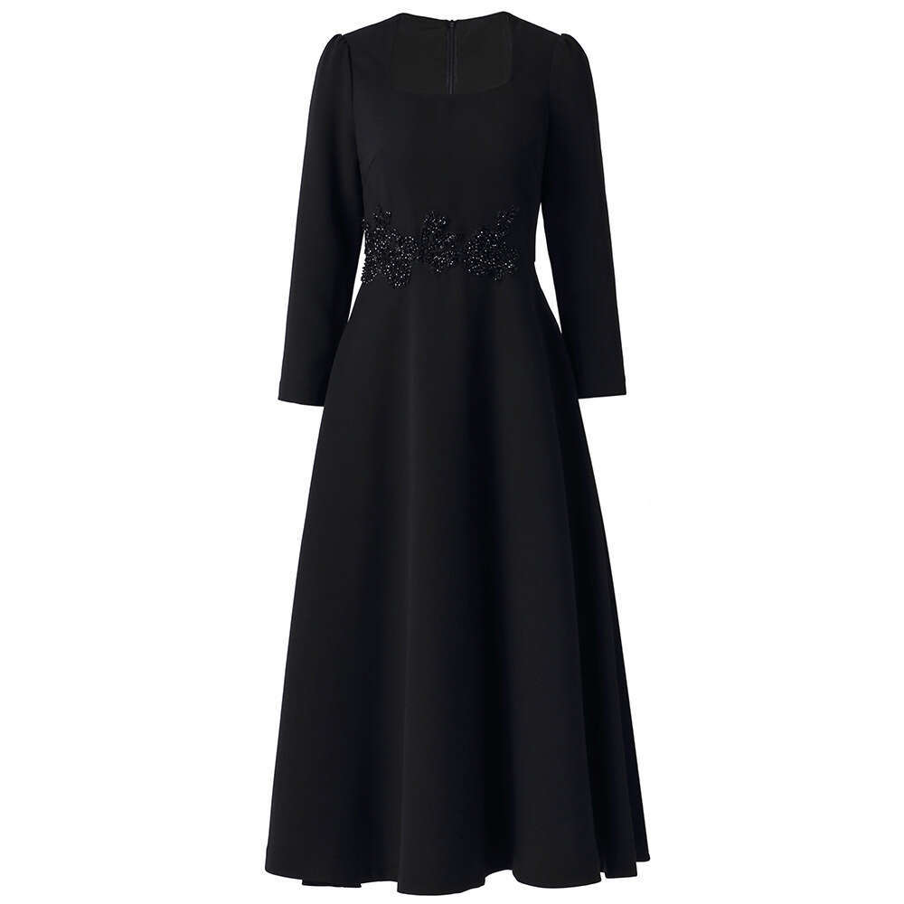 waist studded diamonds exudes sense of luxury elegance with slim fit slimming effect. The dress features nine quarter sleeves a large swing square