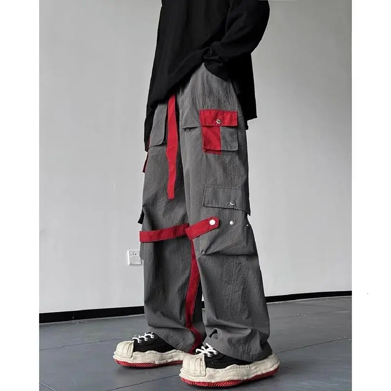 Spring and autumn solid color fashionable elastic waist cargo pants for womens high street casual loose pocket patch work button Y2K Trouser 241007