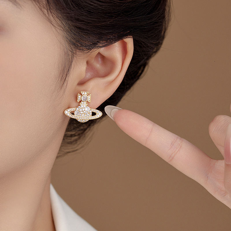 Light , fashionable, high-end, zirconia female niche design, Saturn earrings, versatile temperament, and atmospheric earring trend