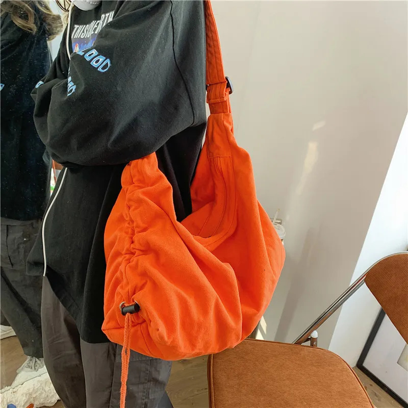 Original Korean Ins messenger canvas bag womens fashion large capacity Japanese student shoulder Ins diagonal garbage bag 241008