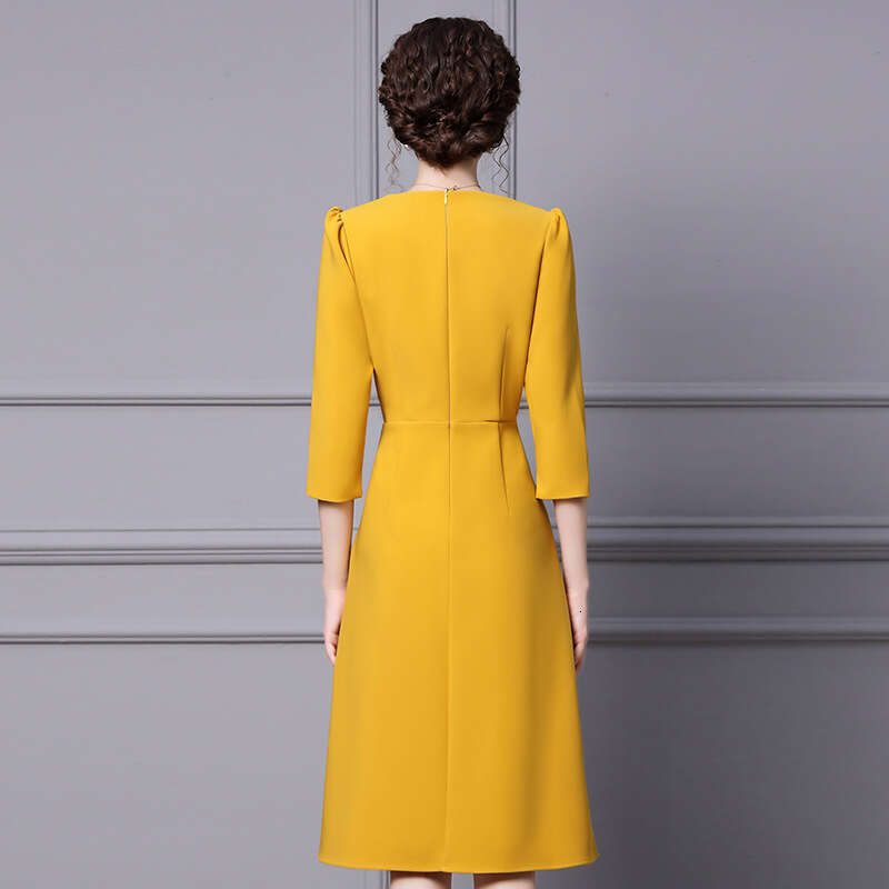 2024 new autumn dress yellow high-end V-neck seven quarter sleeve belly covering nail drill A-line skirt
