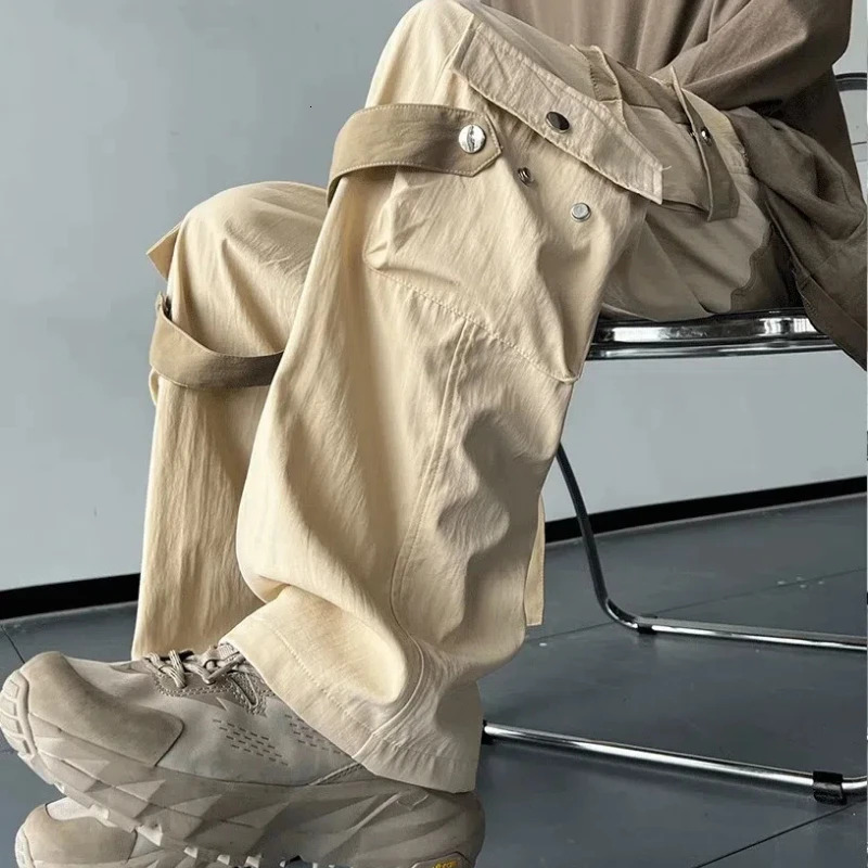 Spring and autumn solid color fashionable elastic waist cargo pants for womens high street casual loose pocket patch work button Y2K Trouser 241007