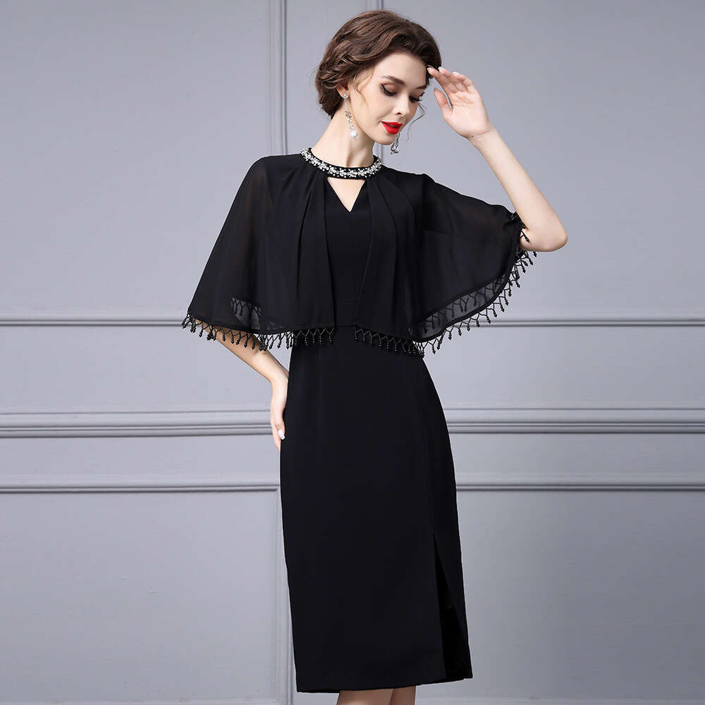 Smart stylish dress exuding an elegant figure socialite temperament. Tassel cape shawl and hip hugging dress