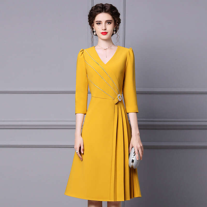 2024 new autumn dress yellow high-end V-neck seven quarter sleeve belly covering nail drill A-line skirt