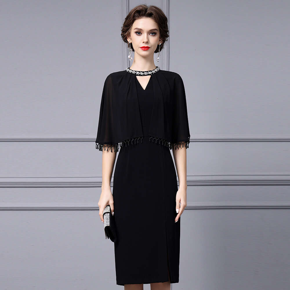 Smart stylish dress exuding an elegant figure socialite temperament. Tassel cape shawl and hip hugging dress