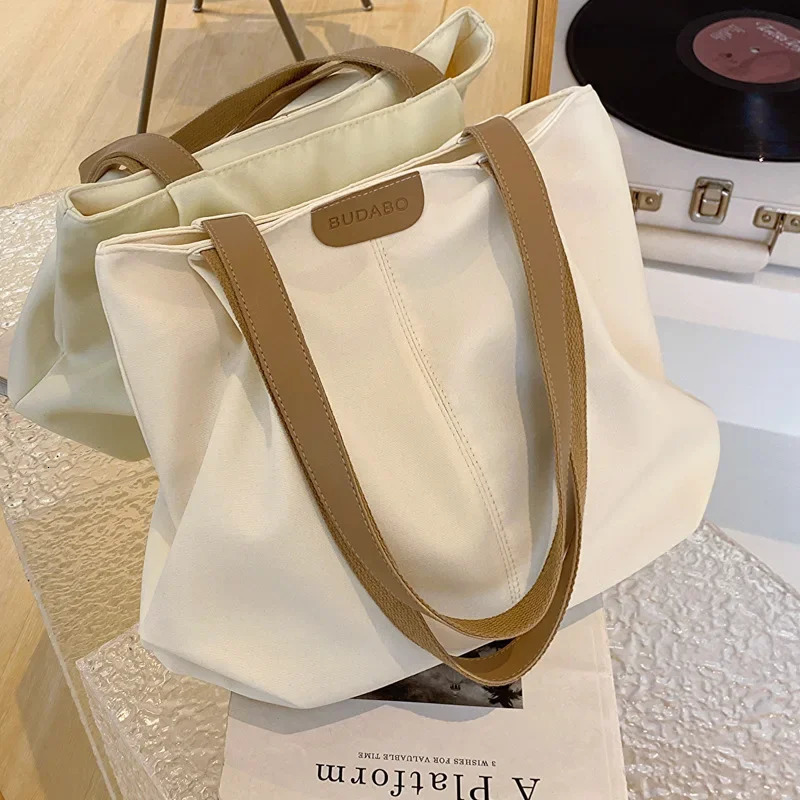 Solid color large capacity canvas handbag for womens Japan Leisure Ins College student class shoulder bag 241007