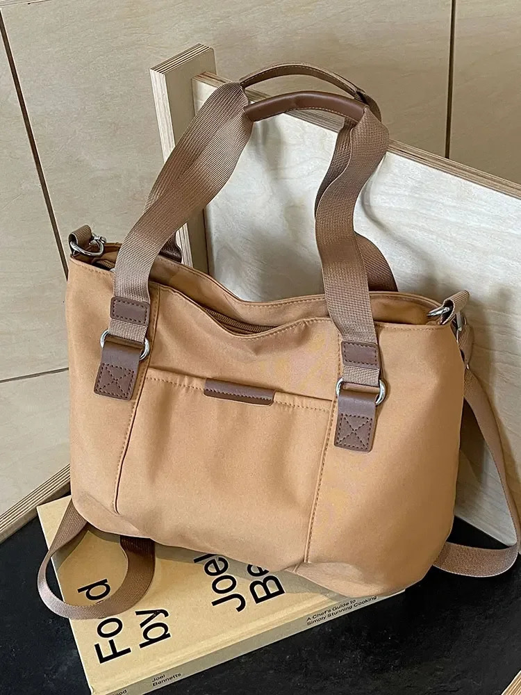 Student handbag commuting fashionable womens shoulder bag Korean casual large capacity Versatile Crossbody handbag 241008