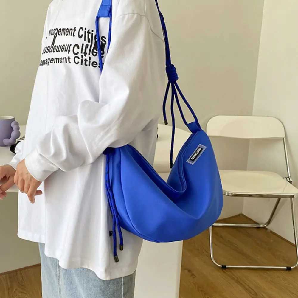 Half moon shaped nylon cross body bag solid color zipper garbage bag large capacity handbag sports messenger bag M241014