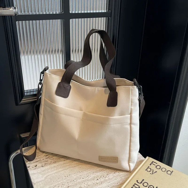 Large capacity trend Korean version womens shoulder bag handbag cross body large canvas student grade backpack travel bag 241008