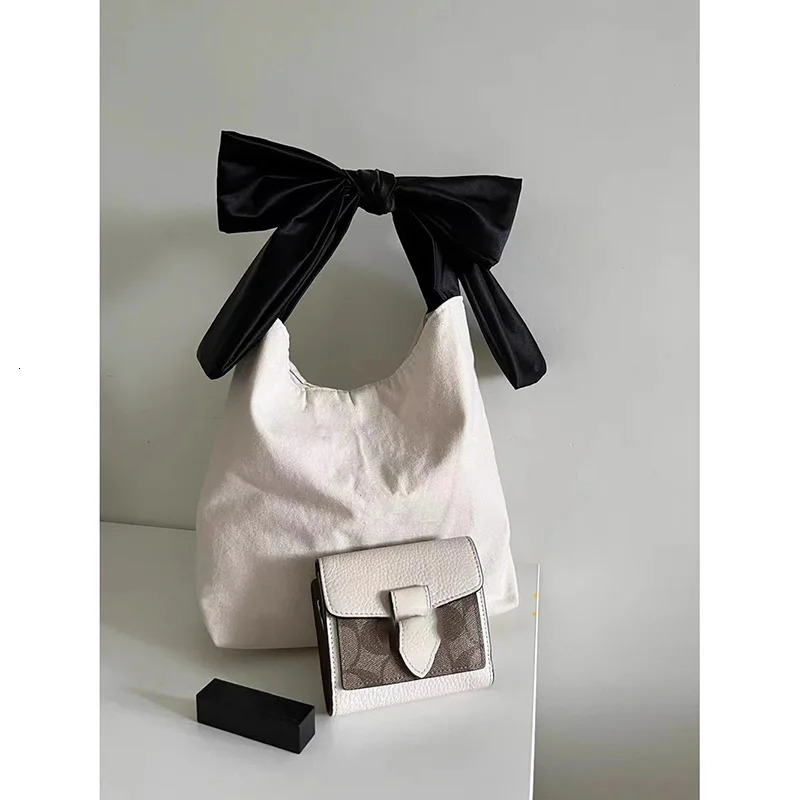 Korean bow handbag simple niche summer canvas bag fashionable large capacity casual shopping bag shoulder bag 241008