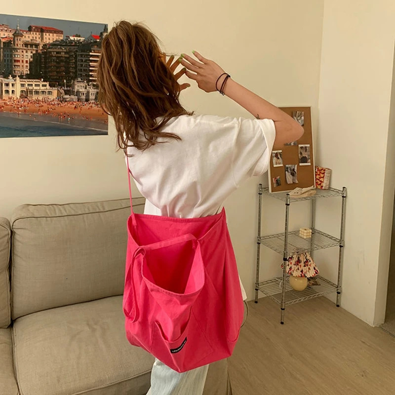 Womens bag solid color canvas bag womens bag large capacity Korean version single shoulder transparent large-span bag pink womens bag 241008
