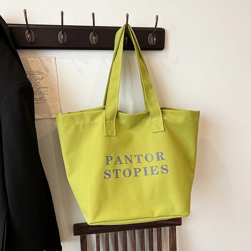 Alphabet canvas bag summer trend Korean niche handbag casual large capacity shopping bag commuting shopping 241008