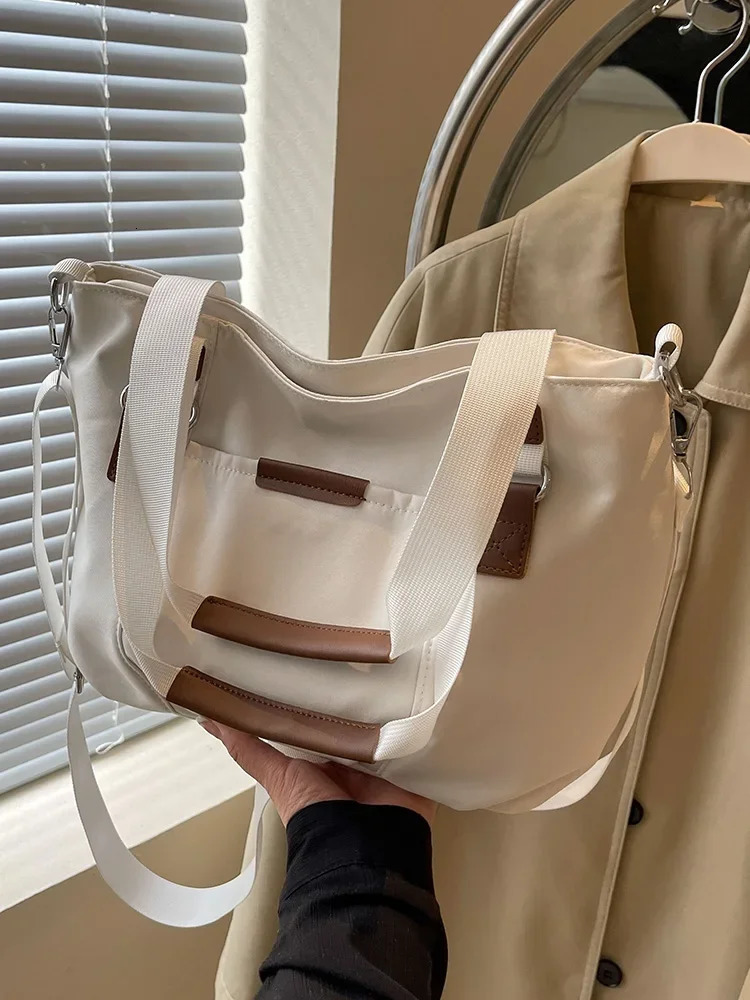 Student handbag commuting fashionable womens shoulder bag Korean casual large capacity Versatile Crossbody handbag 241008