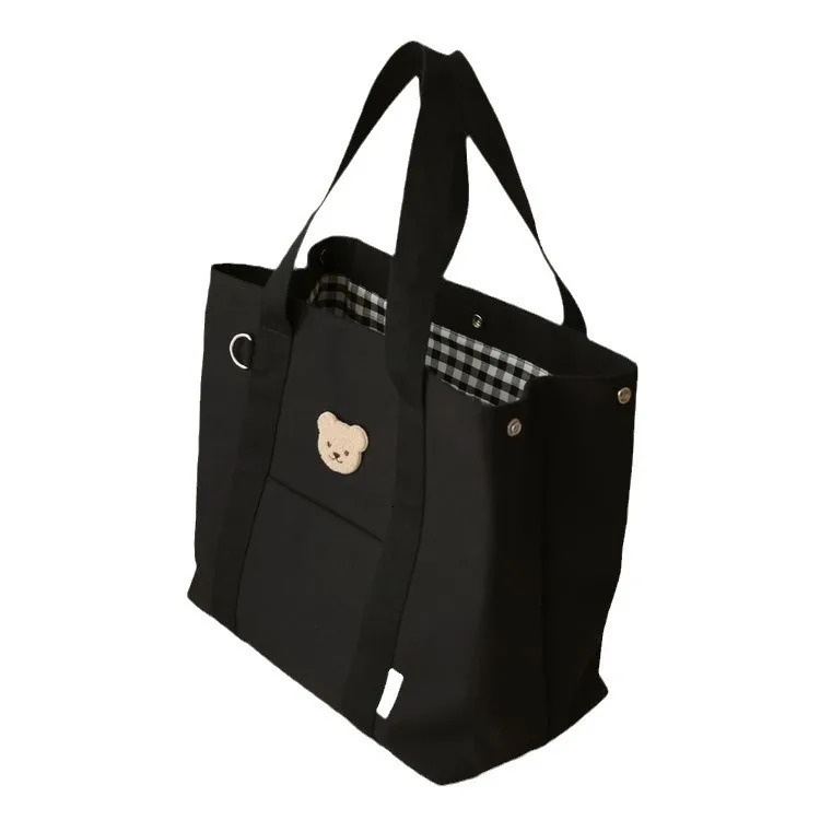 Korean large capacity mother bag mother bag smallest canvas handbag baby stroller hanging bag handbag 241008