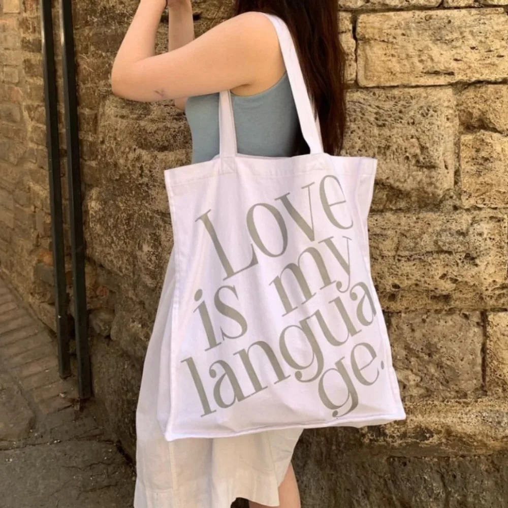 Panel large capacity casual shoulder bag for womens printed letter commuting practical single shoulder matching Korean canvas bag 241008