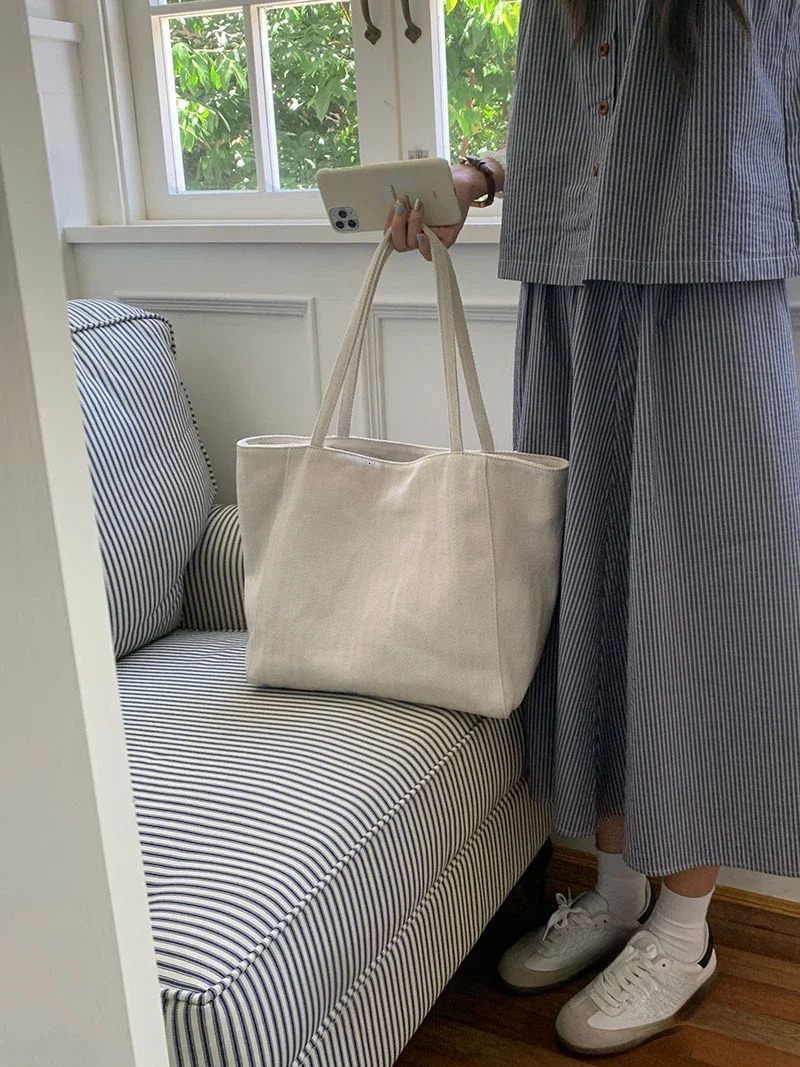 Large capacity womens canvas shoulder bag solid color college commuting shopping bag simple womens handbag wallet handbag 241008