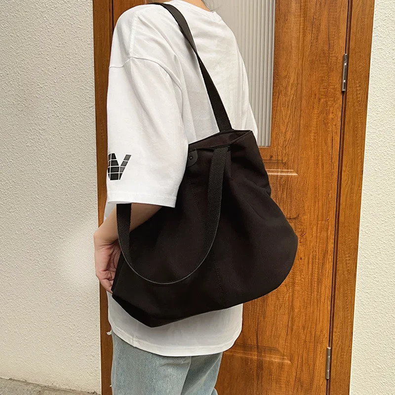 Solid color large capacity canvas handbag for womens Japan Leisure Ins College student class shoulder bag 241007