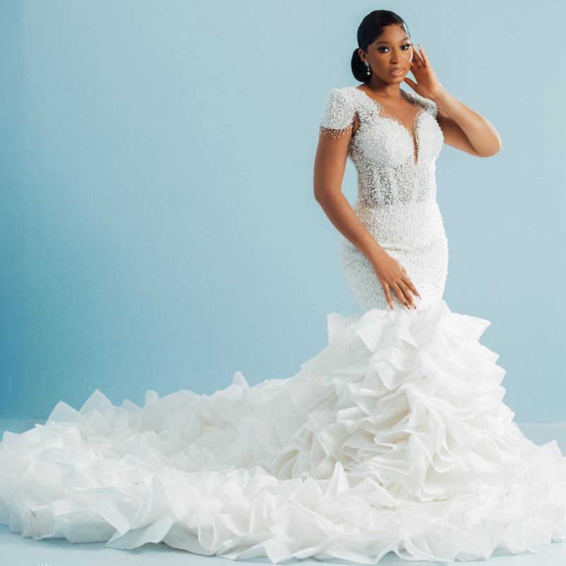 2024 Luxurious Plus Size Wedding Dress Bridal Gowns For Bride Sheer Neck Illusion Mermaid Long Sleeves Beaded Pearls Ruffles Pleated Wedding Gowns for