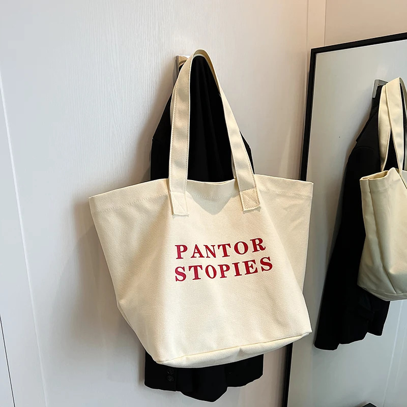 Alphabet canvas bag summer trend Korean niche handbag casual large capacity shopping bag commuting shopping 241008