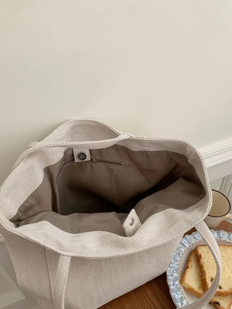 Large capacity womens canvas shoulder bag solid color college commuting shopping bag simple womens handbag wallet handbag 241008