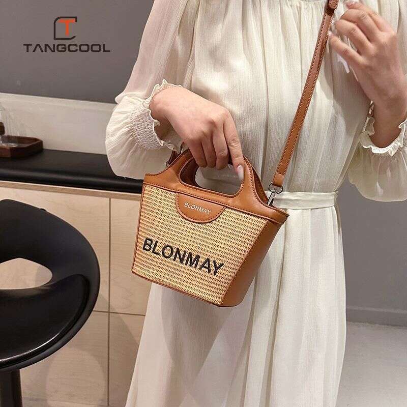 Tang Cool's niche design casual women's new lightweight crossbody bag, fashionable grass woven handbag, shoulder bag