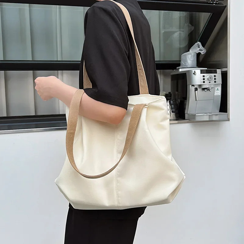 Solid color large capacity canvas handbag for womens Japan Leisure Ins College student class shoulder bag 241007