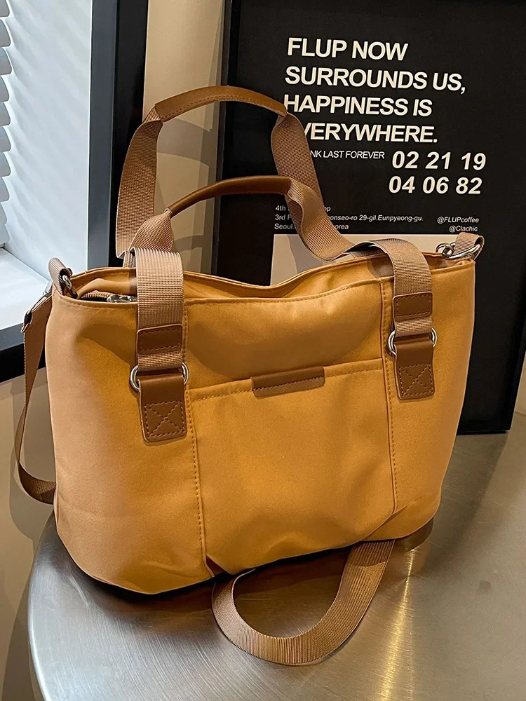 Student handbag commuting fashionable womens shoulder bag Korean casual large capacity Versatile Crossbody handbag 241008