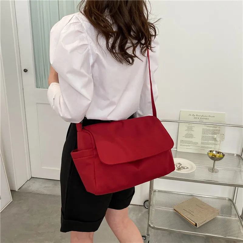 Korean fashion canvas womens handbag shoulder bag nylon womens messenger bag waterproof large capacity travel handbag 241008