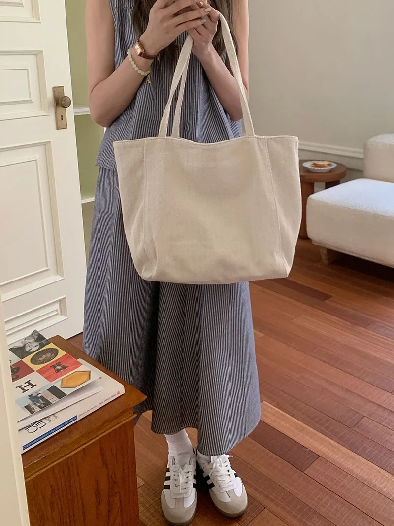Large capacity womens canvas shoulder bag solid color college commuting shopping bag simple womens handbag wallet handbag 241008