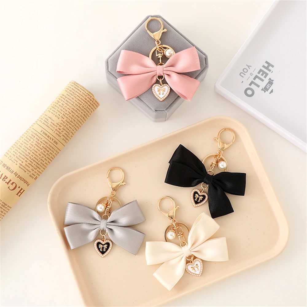 Sweet ribbon bow heart-shaped charm keychain bow with metal tag pendant key bag decoration car tricycle accessories gifts Y241014