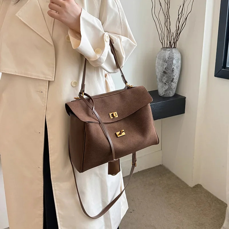 suede womens handbag retro cross shaped bag retro lock large barrel shoulder bag 241011