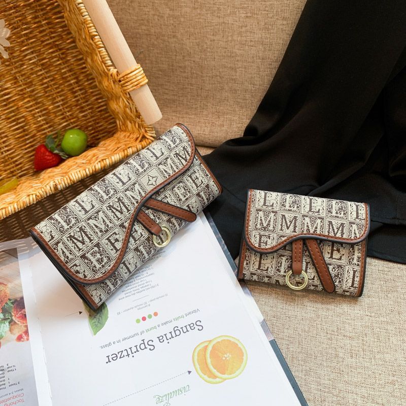 2025 Designer Short Womens New Printed Multi Card Slot Large Capacity Long Wallet Premium Internet Celebrity Handbag New Free Delivery Designer Bag
