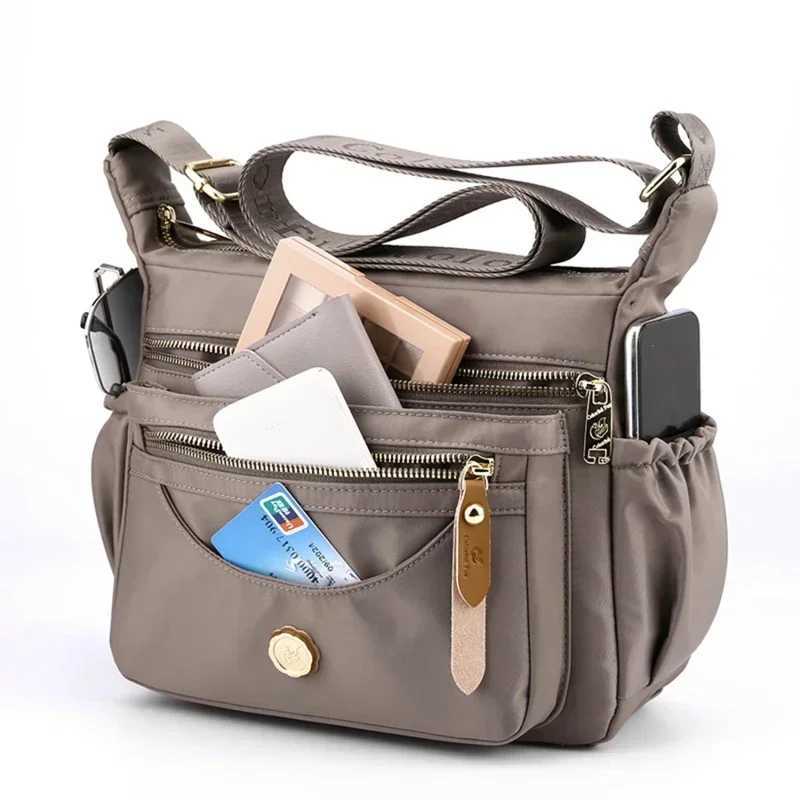 Luxury handbags womens bags designer wallets and handbags fashionable nylon cross font womens bags new travel shoulder Bolsa Sac M241014
