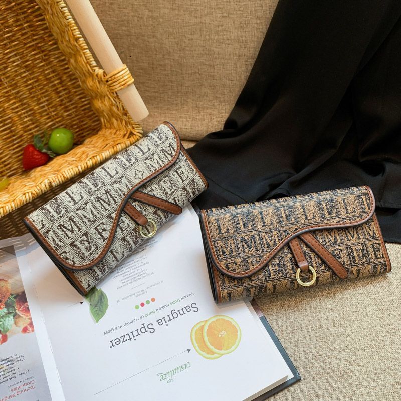 2025 Designer Short Womens New Printed Multi Card Slot Large Capacity Long Wallet Premium Internet Celebrity Handbag New Free Delivery Designer Bag