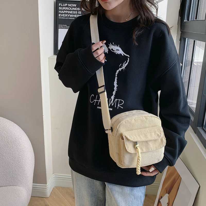 Simple cross shaped bag fashionable and casual small square bag personalized shoulder bag M241014