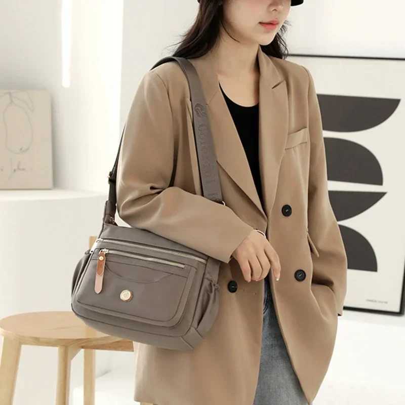 Luxury handbags womens bags designer wallets and handbags fashionable nylon cross font womens bags new travel shoulder Bolsa Sac M241014