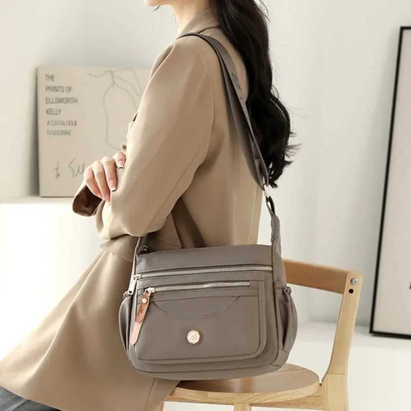 Luxury handbags womens bags designer wallets and handbags fashionable nylon cross font womens bags new travel shoulder Bolsa Sac M241014