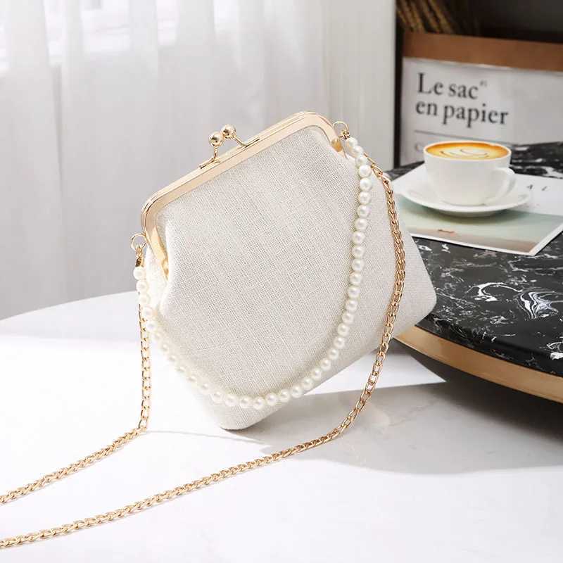 Womens pearl handbag womens wallet and handbag kiss lock chain strap crossover mini messenger bag M241014