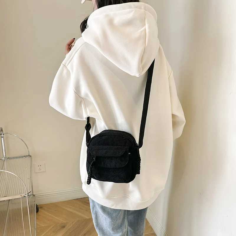 Simple cross shaped bag fashionable and casual small square bag personalized shoulder bag M241014