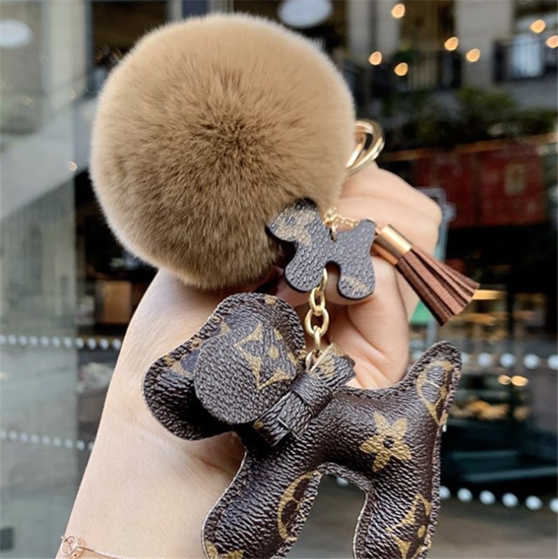 Designer keychain puppy real fur ball pendant key chain car pendant metal fashion personalized creative accessories