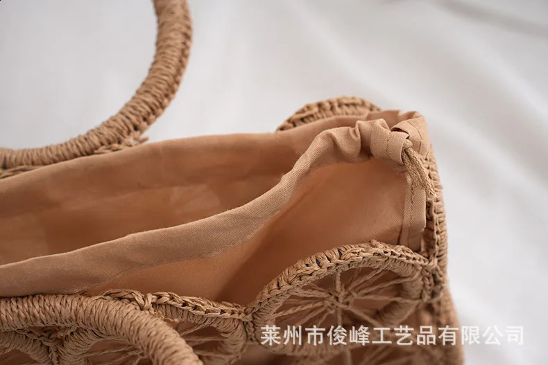 Paper rope woven wheel bag crossed boundary hollow large capacity circular tourism beach handbag 241014