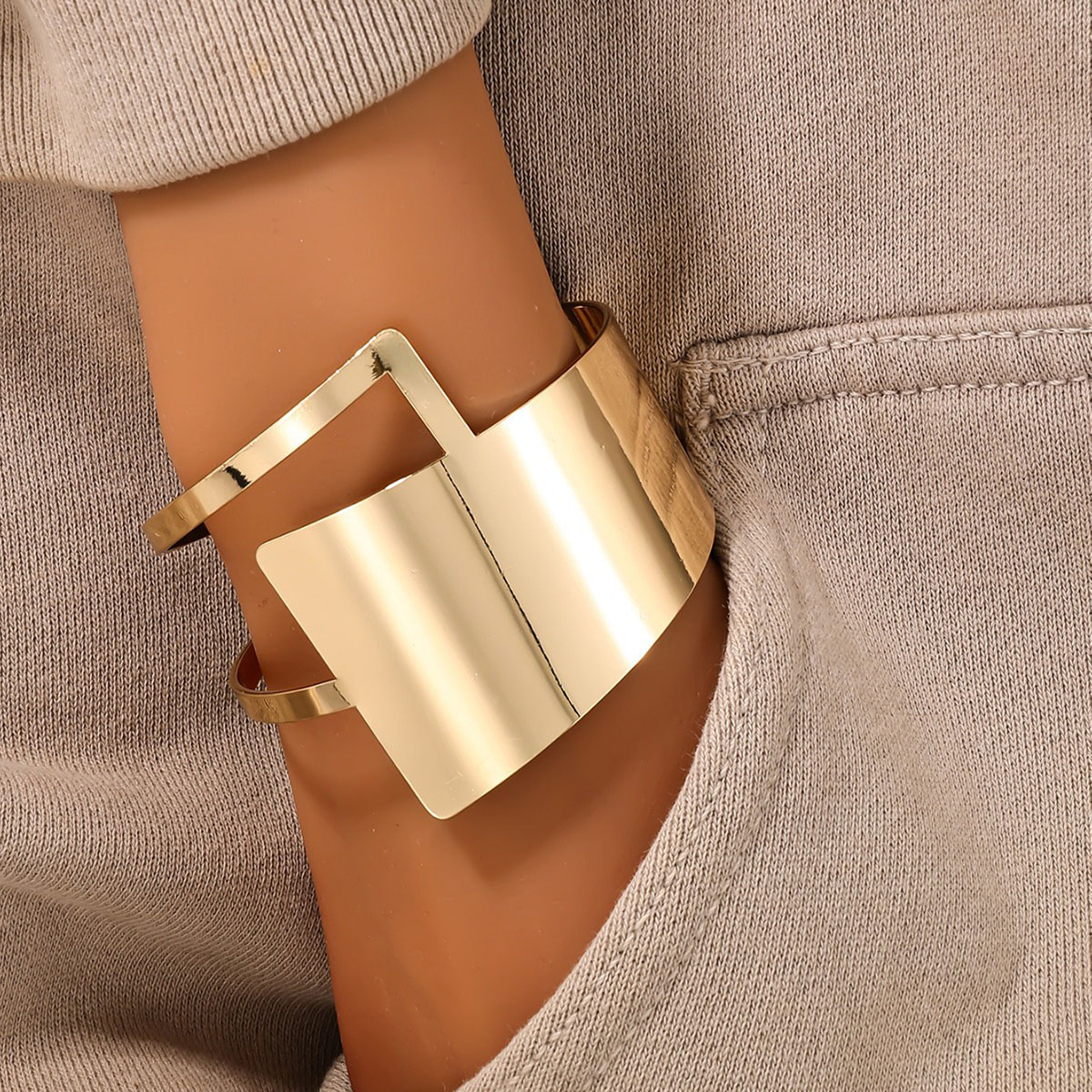 Elegant Metal Circular Pattern Bracelet - Modern Edgy Wide Band Jewellery Perfect for Urban Wear
