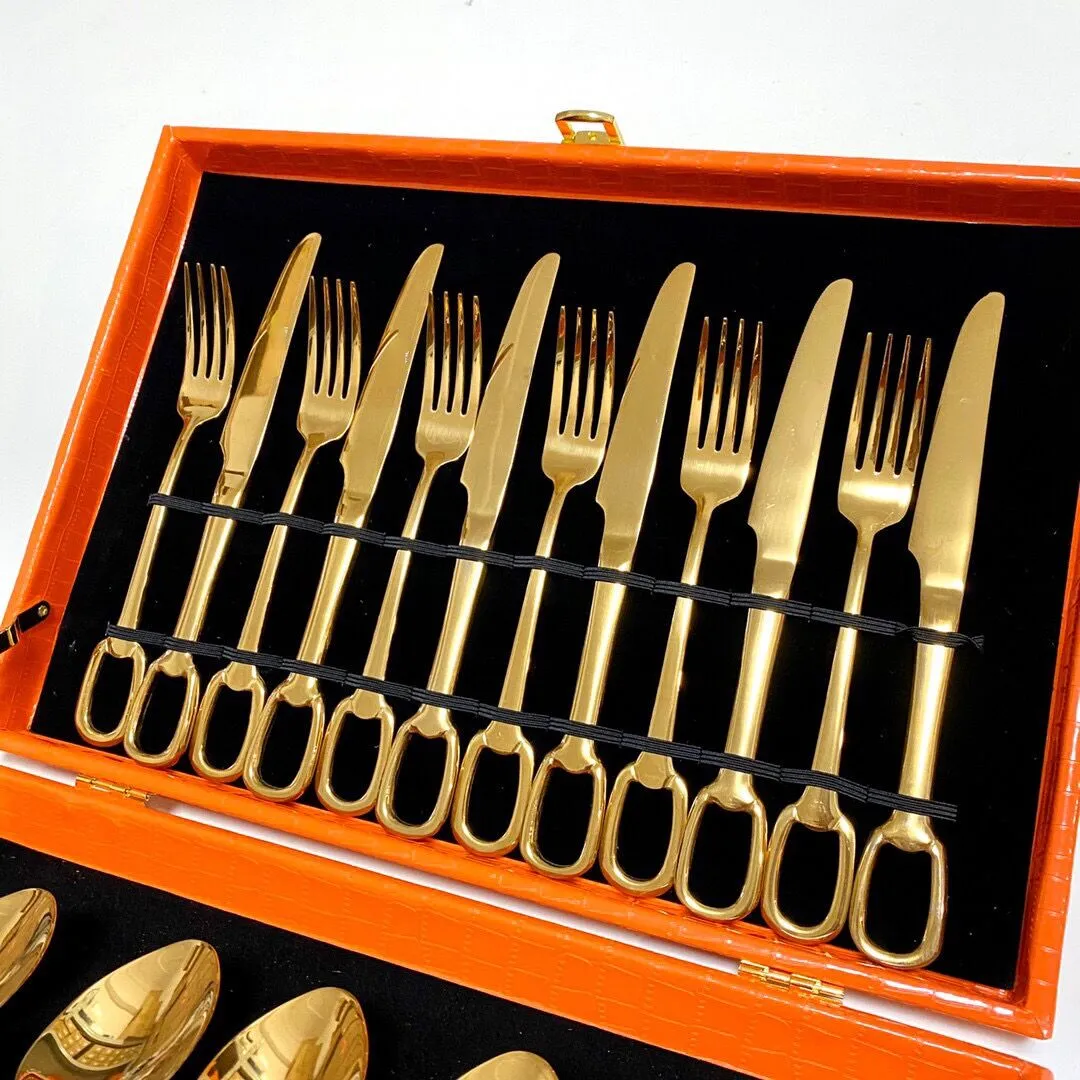 Designer cutlery set with 24 knives forks and spoons featuring silver and gold cutlery set X250107