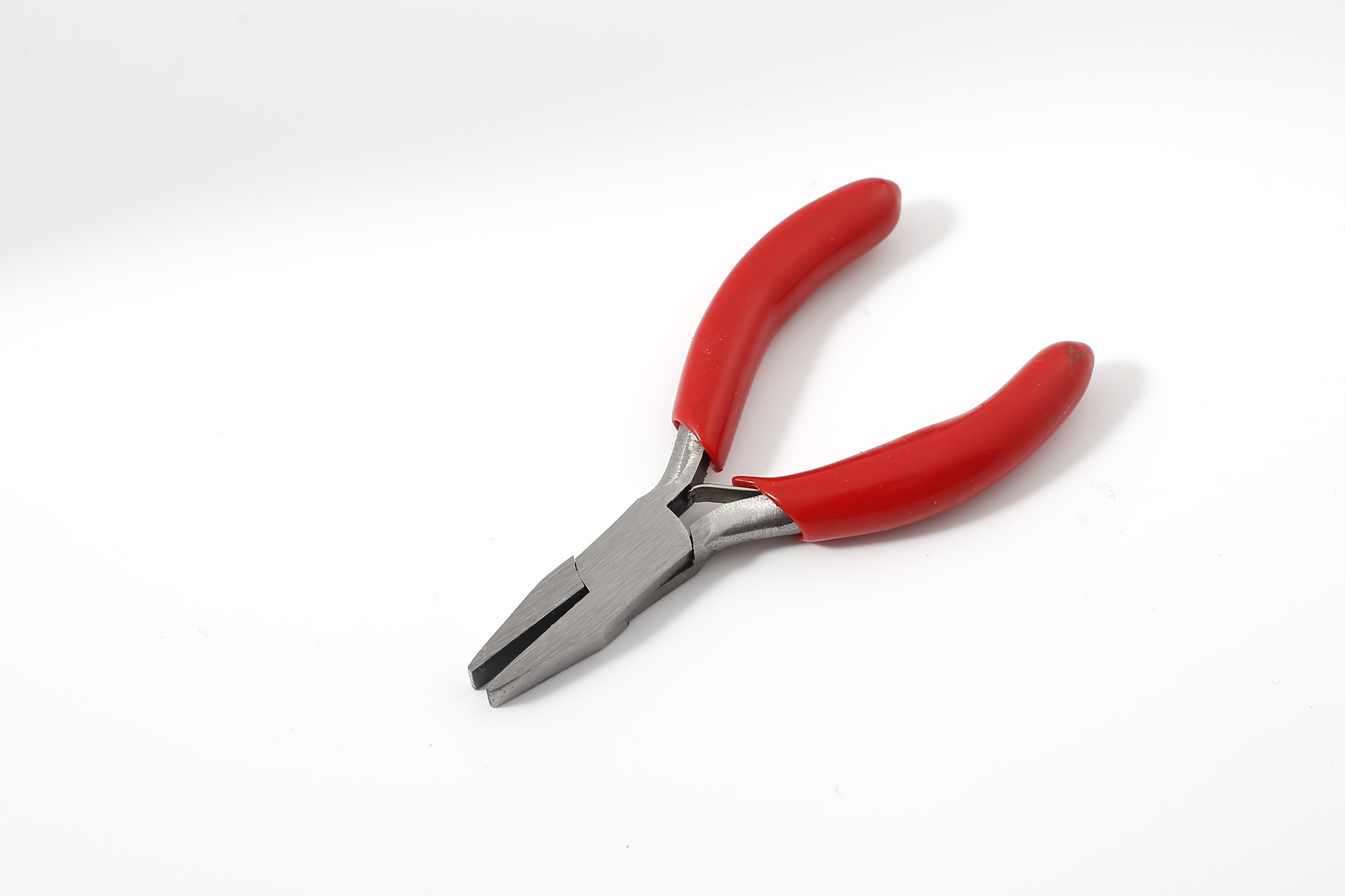 3-inch mini pliers with plastic coated handle surface polished in natural color